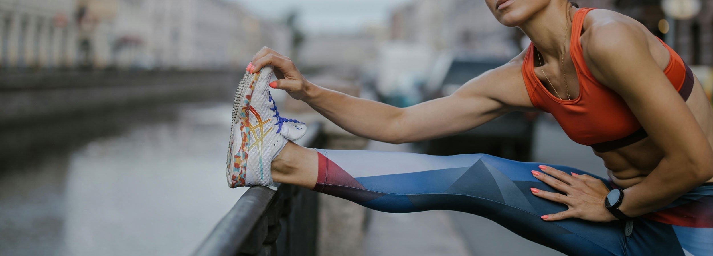 Woman doing pre-run leg stretching warm-up exercises, Neenca's simple tips to keep your joints healthy and protected