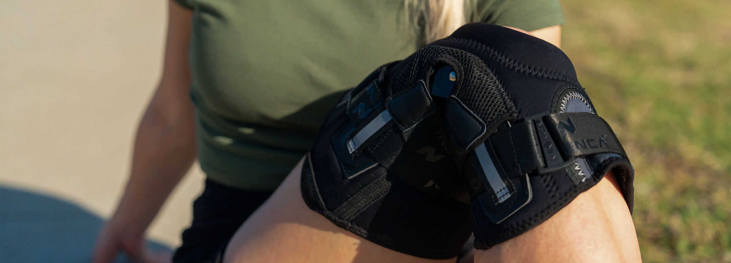 Woman stretching in a Neenca hinged knee brace