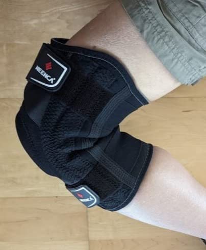 Customer wearing a NEENCA support