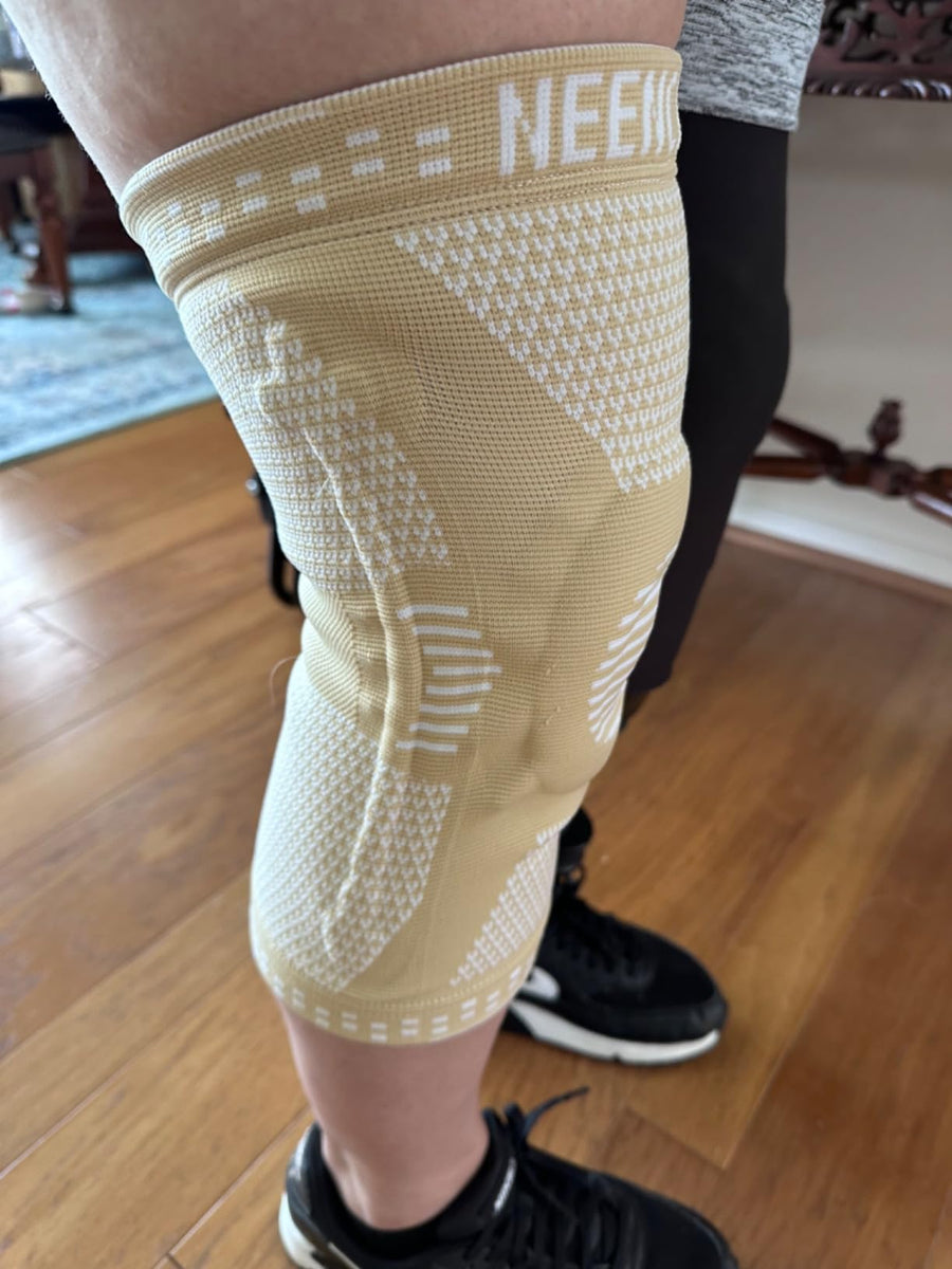 Customer wearing a NEENCA support