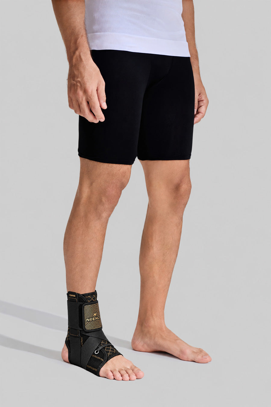 Side view of NEENCA HH004 ankle brace worn on the foot, showing its supportive structure and adjustable straps.