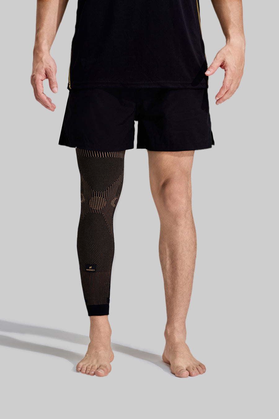 NEENCA HT002 copper-infused compression leg sleeve worn on a man's leg, front view.